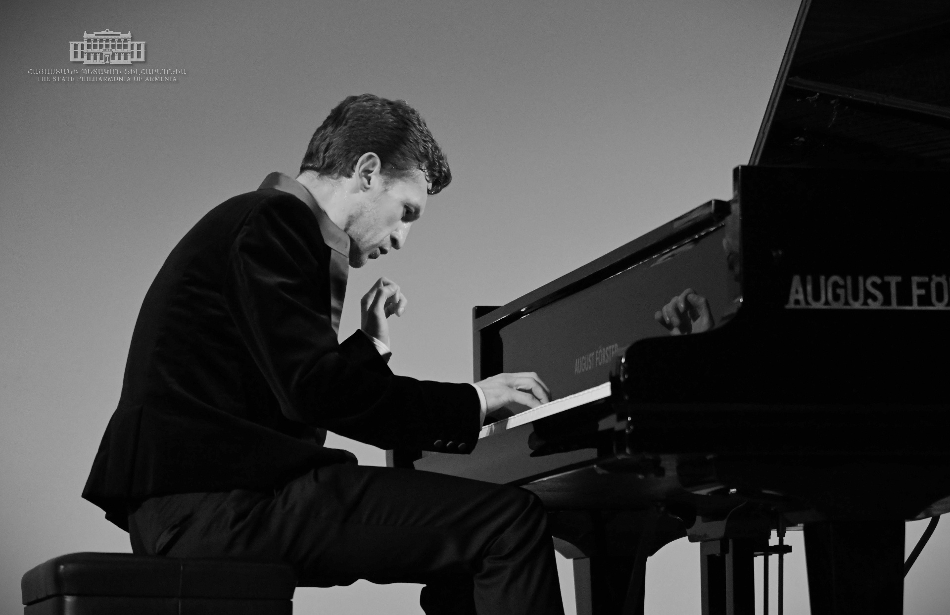Ilya Ramlav performing at the piano